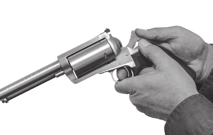 9. UNCOCKING THE BFR REVOLVER If the revolver is cocked and you wish to let the hammer down to its forward position (against the frame) proceed as follows: USE EXTREME CARE WHEN ATTEMPTING TO DECOCK
