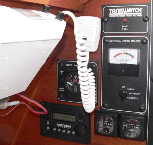 DC Energy (Battery) Monitor To the right of the helm in the starboard side wall is the DC voltmeter that monitors the boat s batteries.