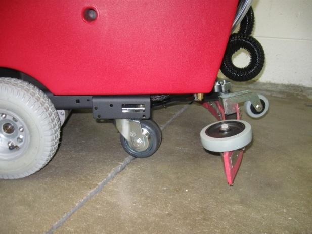 MiniMag scrubber has a 4-point stance for stability over rough surfaces.