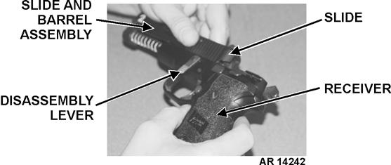 c. Use thumb to rotate disassembly lever DOWN until it stops.