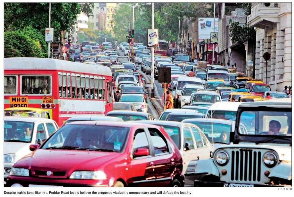 (Peak Hour Peddar Road) Traffic congestion affects bus through put, compelling many