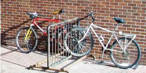 Bicycles attached to a wheel-bender rack are more easily stolen because only the front wheel can be locked to the rack.