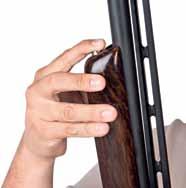 Holding the receiver and stock by the pistol grip with the right hand, engage the barrel into the action at about a 45