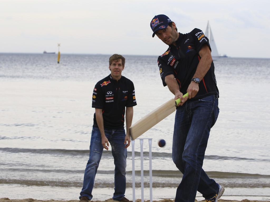 Off-track Before competing for real on the circuit, Vettel and Webber play cricket on