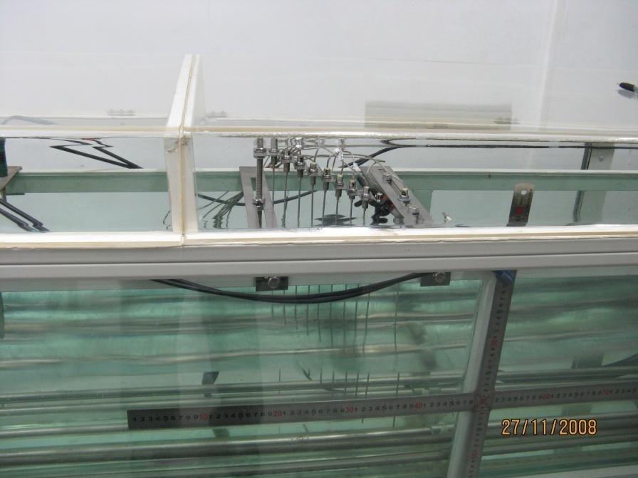 Laboratory experiments: Wave tank: 5m in length with height of 0.4m and width of 0.2m.