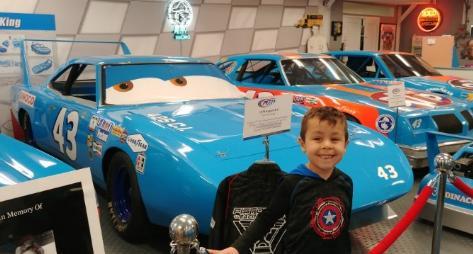 burger and flies. Luke In Front Of Petty s 43 Jr 1965 Plymouth Barracuda.