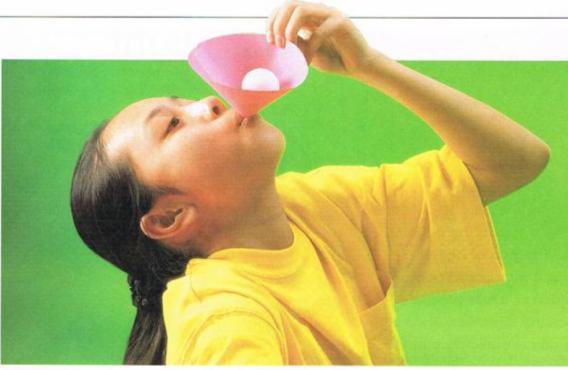 5. Blow into the bottom of a funnel that has a ping pong ball in it