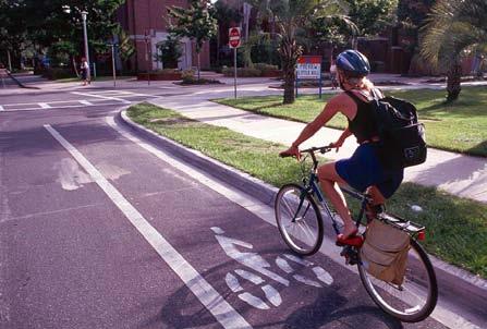 A minor arterial is the preferred street classification to accommodate bicycle lanes because the wider lane can handle separated bicycle traffic.