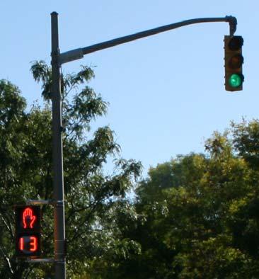 (City of Ottawa) To indicate an appropriate time for pedestrians to cross the roadway Ensure that the pedestrian signals are visible to the pedestrians