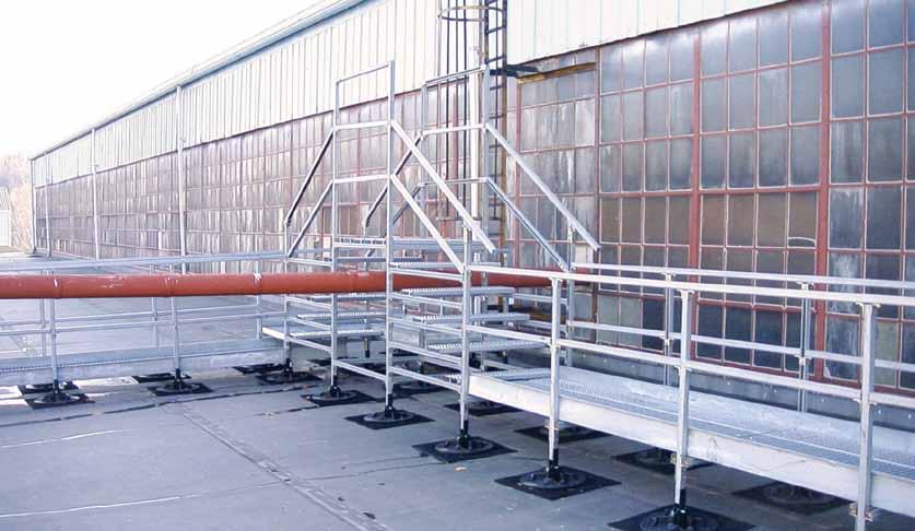 Roof top walkway systems, work platforms, and crossover platforms offer a solution