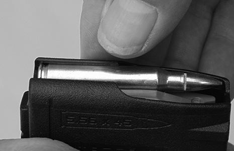 Depress lower position of bolt stop while retracting charging handle to lock bolt carrier to the rear. 3. Ensure that you are using the proper caliber ammunition for your firearm.