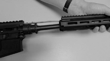 The system consist of a unique barrel nut, handguard, two locking tabs and four 8/32 T-20 Torx screws. 1. POINT GUN IN SAFE DIRECTION WHILE KEEPING FINGER OFF THE TRIGGER. 2.