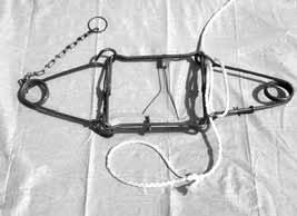 Trappers should be familiar with the safe and efficient use of bodygrip traps and these are best learned in trapper education courses. Figure MT3a. Setting tool Figure MT3b.