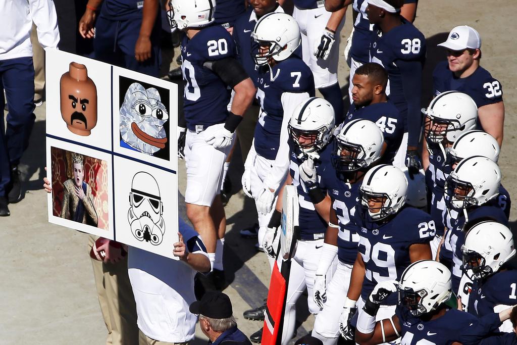 Football coaches finding creative ways to call plays By Lance Lysowski November 11, 2015 Defensive signals are sent in from the Penn State sidelines during a game against Indiana last month.