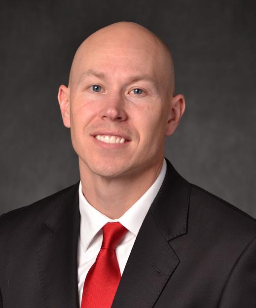 Smith, a former NAIA National Coach of the Year, was named the 17th head coach in s men s basketball history in the spring of 2014 after spending two years as an assistant coach at Nebraska.