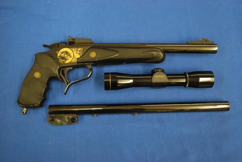 27. Thompson Center Contender Pistol, Leupold Scope and Accessory Lot Serial # 305121, 44 Mag and 222 Rem calibers, 12" 44 Mag TC Custom Shop ported barrel with excellent bore mounted on the pistol,