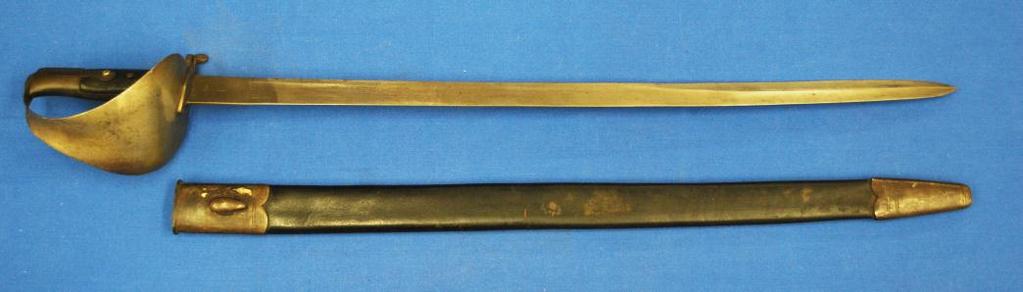 40. British Pattern 1859 Type II Naval Cutlass Bayonet For the British 1859 Navy rifle. This is a scarce example of the British Pattern 1859 Type II Naval Cutlass Bayonet.