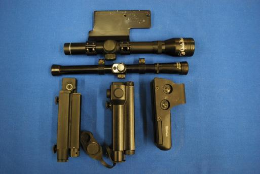 55. Optics Lot of Five Scopes Nice assortment of optical and electronic red dot type devices, some with built in mounts, ready to slide on to rails and one with a side mounting plate for shotgun.