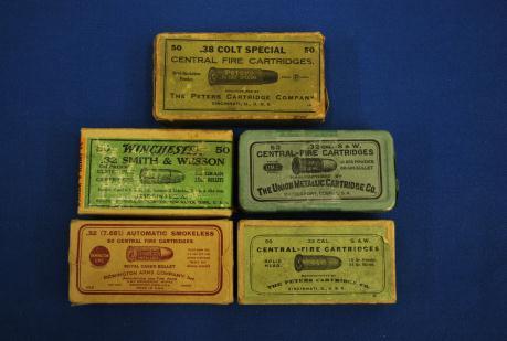 This is solid, good color but poor condition. 11-126-0090 BACK (80-110) 136. Vintage.32 &.38 Ammunition Boxes This lot includes a Remington U.M.C. 32 automatic smokeless tan box, red lettering.