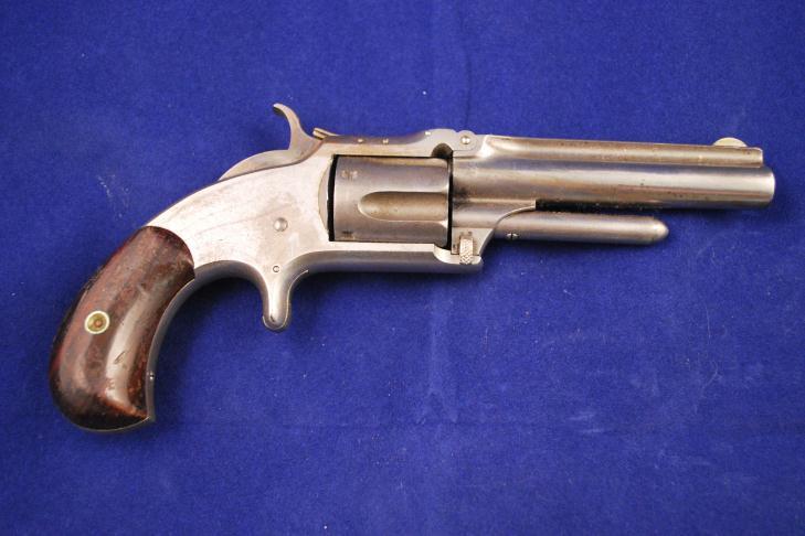 204. S&W Model 1 1/2 New Issue 32 - SA Revolver Serial # 108777,.32 RF, round 3 1/2" round barrel with fluted top ramp. Clean bore with some deep pits of corrosion. Mfgd 1868-1875.