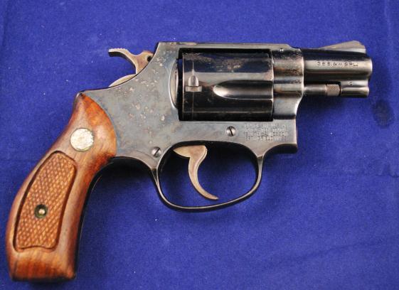 22 cal - 7 shot, 3 1/4"round barrel with fluted top ramp and fair bore. Manufactured 1860. Antique S&W tip-up revolver.