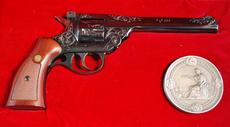 H&R Model 999 "Sportsman" Cased- One of 999 Serial # 999778,.22 LR, 6" half round barrel with flat tapered sides. Excellent bore.