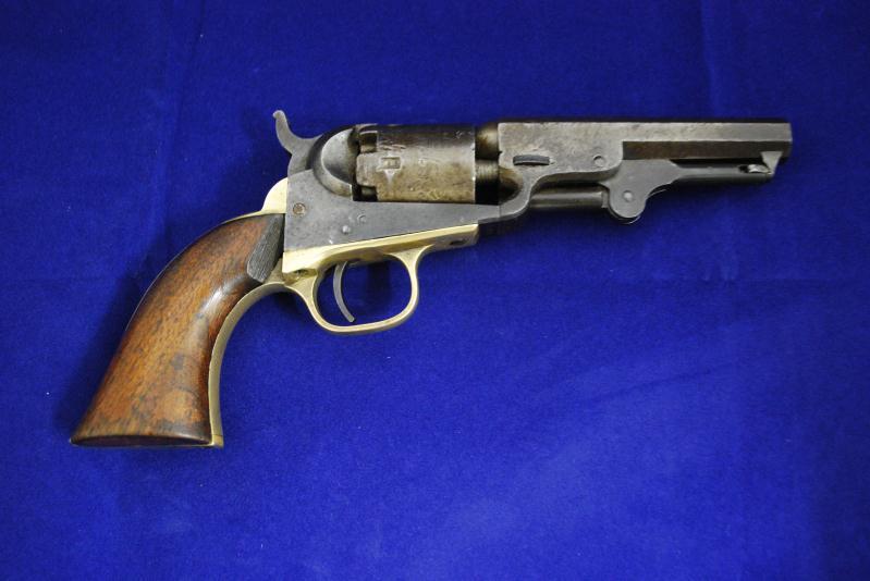 21. Colt Pocket Navy Revolver Serial # 286178,.31 caliber percussion, 4" octagon barrel with fair to good bore. Manufactured 1849-1850. Colt pocket Navy revolver with short 4" barrel.