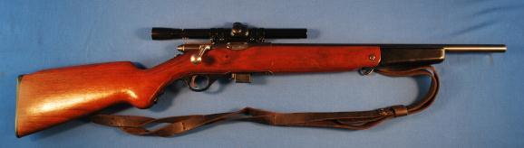 319. Mossberg Model 142-A Bolt Action Rifle NSN,.22 S/L/LR. 18 1/2" round barrel with excellent bore. Manufactured 1949-57. Carbine w/ fold down forearm - walnut stock w/ sling.