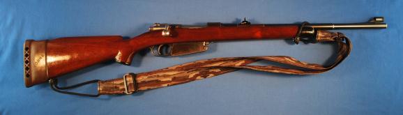 326. Yugoslavian Model 24/47 Mauser Serial # A2786, 8mm Mauser caliber, 23-1/2" barrel, with good but dark/pitted bore. The metal is in good condition with normal wear for a military rifle.