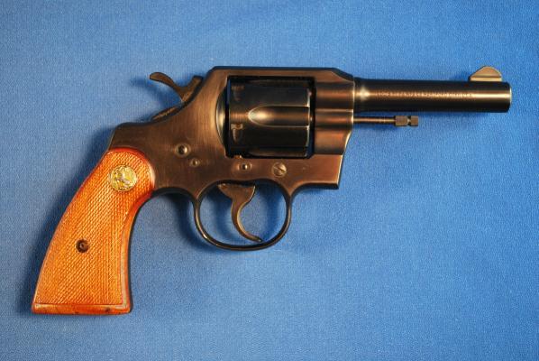 23. Colt Police Positive.38 DA Revolver Serial # 843326,.38 Special, 6 shot, 4" round barrel with excellent bore. Manufactured 1947. All original. 98% blue finish, original grips.