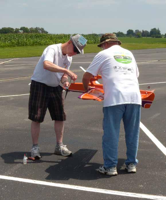 Wesley Dick, age 85 soon to be 86, gets ready to start his plane for an official flight.