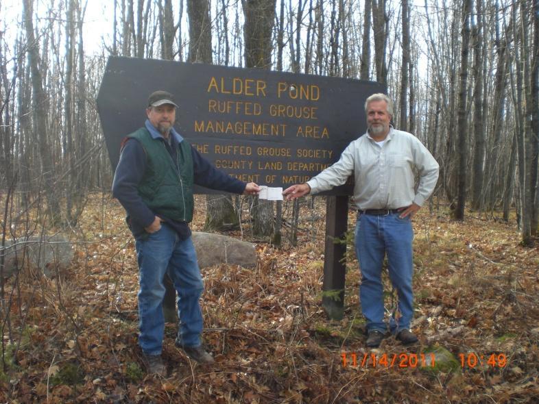 2011 Drummer Funds- (last year s fund was about 20K) Roger Clark accepts an RGS Drummer Fund check to help with trail improvements at Alder Pond RGMU Alder Pond RGMA ($1200) RGS assisted Itasca
