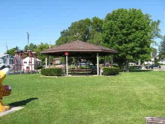 6. Public Park: City owned Public Park that consists of playground, bathroom