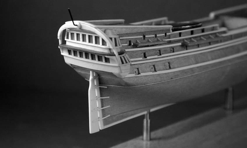 Figure 5. this scale. Figures 5 and 6 show the stern and bow detailing, mostly accomplished with styrene.