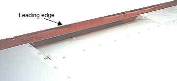 Its purpose is to reduce span-wise movement of air flowing laterally along the wingspan.