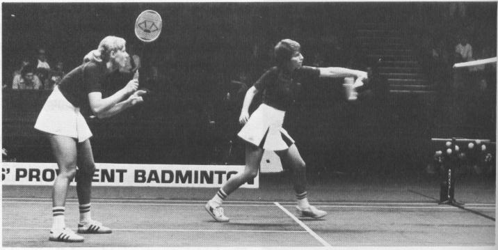Part Two: Playing Doubles 10 Fig. 120 Plate 31. lane Webster plays an underarm net reply to the low serve. Fig. 121 Receiver travels forwards to attack the low serve. Fig. 122 Receiver lobs shuttle to serving side's backhand RC Players adjust their positions to attack and defence formations.