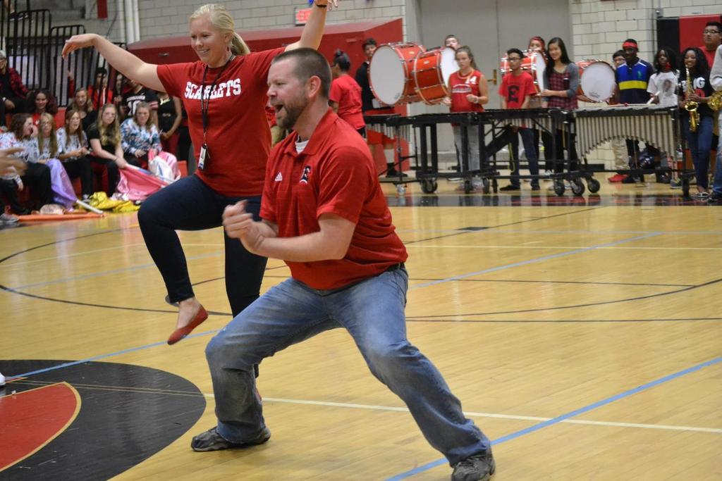 SIL Boston Freilinger and counselor Ashlee Dimstrua Dancing in the Homecoming assembly. Assembly was on Oct. 9 in the gym.