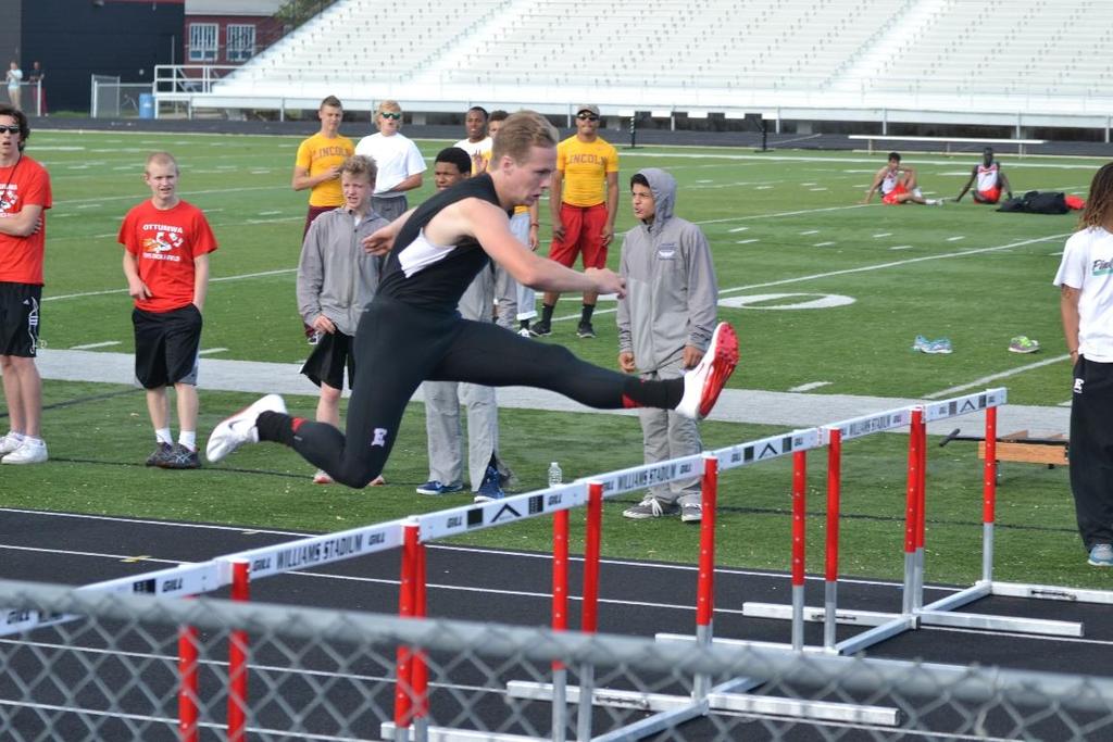 WRITE A CAPTION FOR THIS PHOTO May 7, 2015 at Williams Stadium- the CIML Metro track meet hosted by DM East Junior Rory Walling Running the