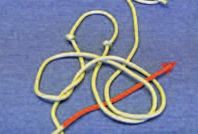 Take the same strand and cross it up and over, creating a second loop opposite of the first. 1. 2. 3. 4.