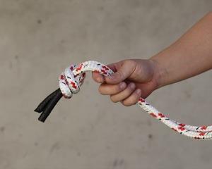 Step 1: To shorten the rope length you may tie another knot in the rope near the ball. You may also move the bottom knot closer to the ball.