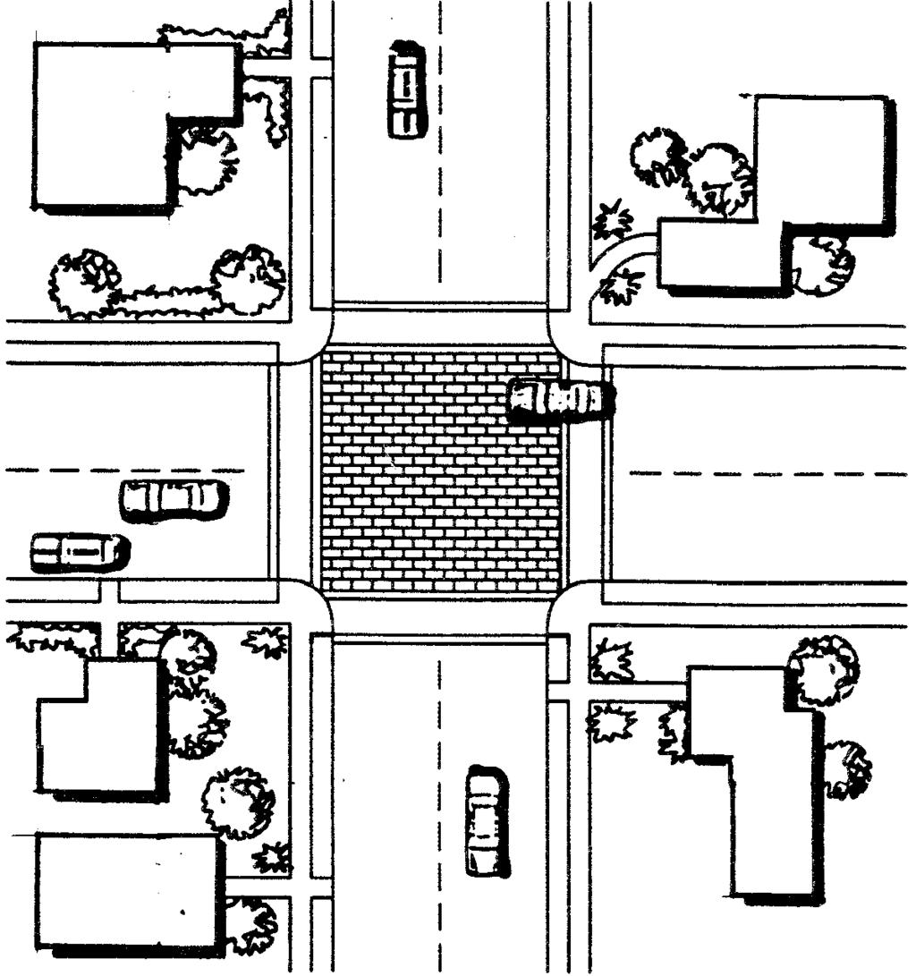 islands, placed in intersections, around which traffic circulates.