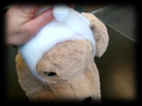 Clinical Skills: 7 8 9 Continue bandaging around the head,