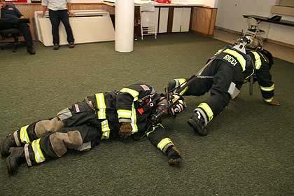 ) Click to enlarge Stair Drags (photos 17-21). The device is not recommended to move a firefighter up or down stairs.