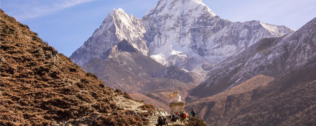 Popularly known as the Matterhorn of the Himalaya, the overwhelming ice-coated granite pyramid of Ama Dablam dominates the sky above the trekker s trail to the Everest Base Camp.