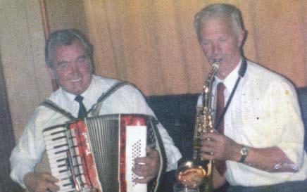 Paddy (left) performing in The Silver Dollar, Ballyhaunis, 1986, with Paddy Hunt, Larganboy (R.I.P.). went by that The Three Gems were not booked to play at a wedding reception in some part of London, such was the popularity of the Irish band.