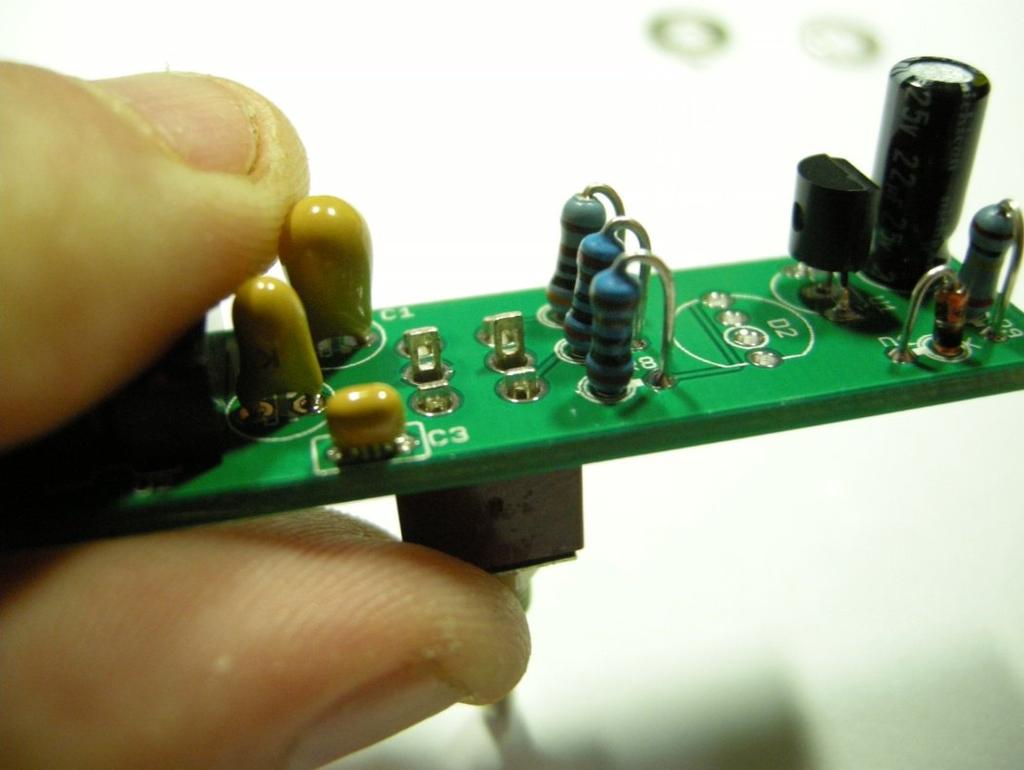 Turn the board over and solder the switch