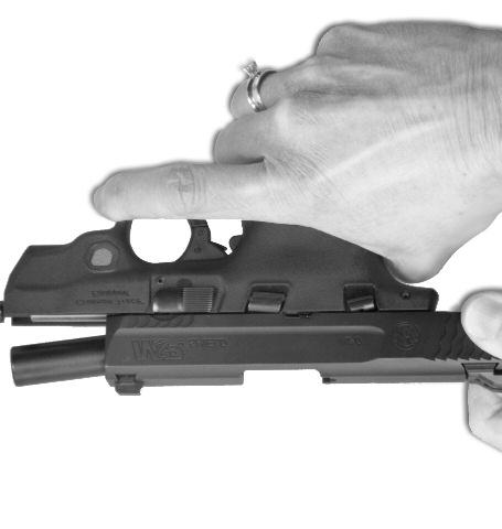 Make sure your finger is off the trigger and out of the trigger guard.