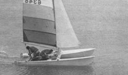Do not attempt to tack while sailing on a reach. The skipper should now move aft, into the center, and swing the hiking stick to the new side.