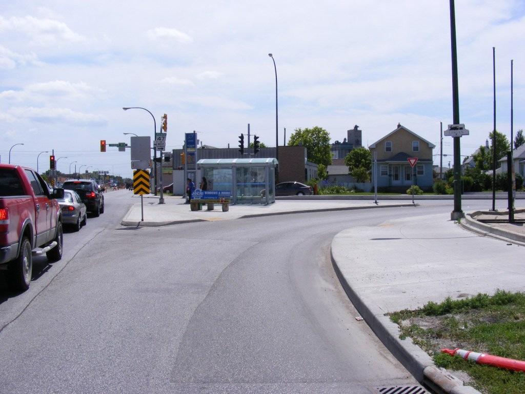 Figure 5 McPhillips Street right turn onto Logan Avenue demonstrates the benefits of placing the pedestrian crossing upstream for visibility Commentary on the effect of placing curb ramps at various