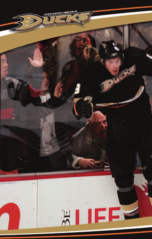 Bobby Ryan celebrates with a leap into the glass after scoring one of his two goals in a 4-0 Ducks